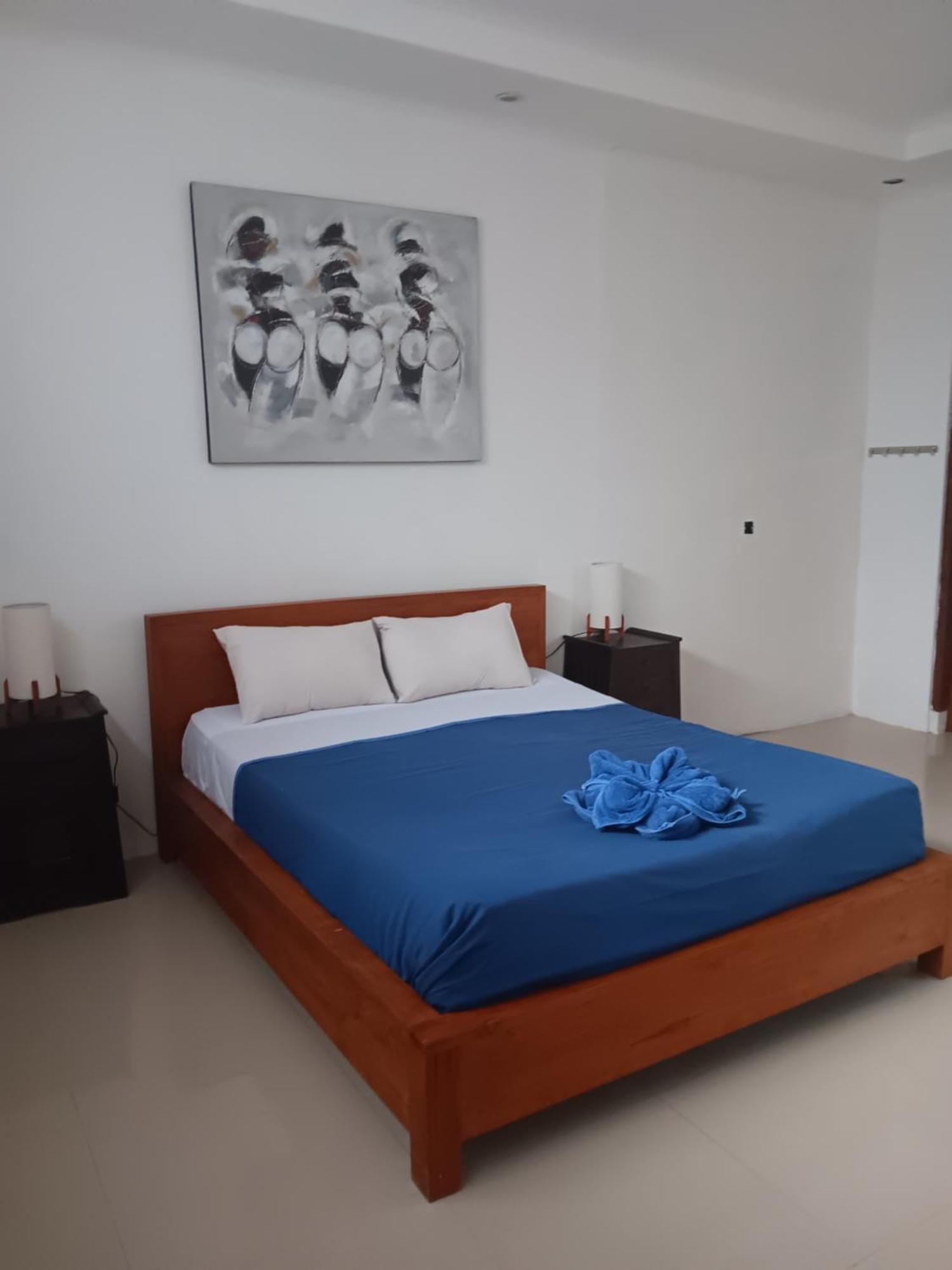 Adore Guesthouse Amed Zimmer foto