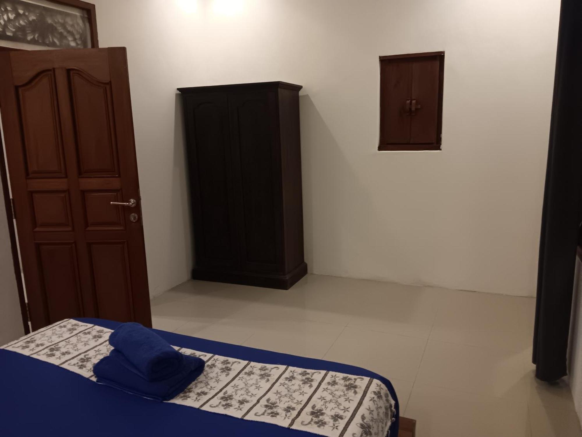 Adore Guesthouse Amed Zimmer foto