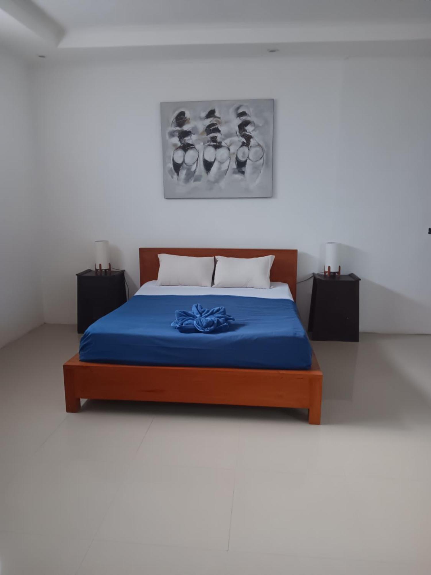 Adore Guesthouse Amed Zimmer foto
