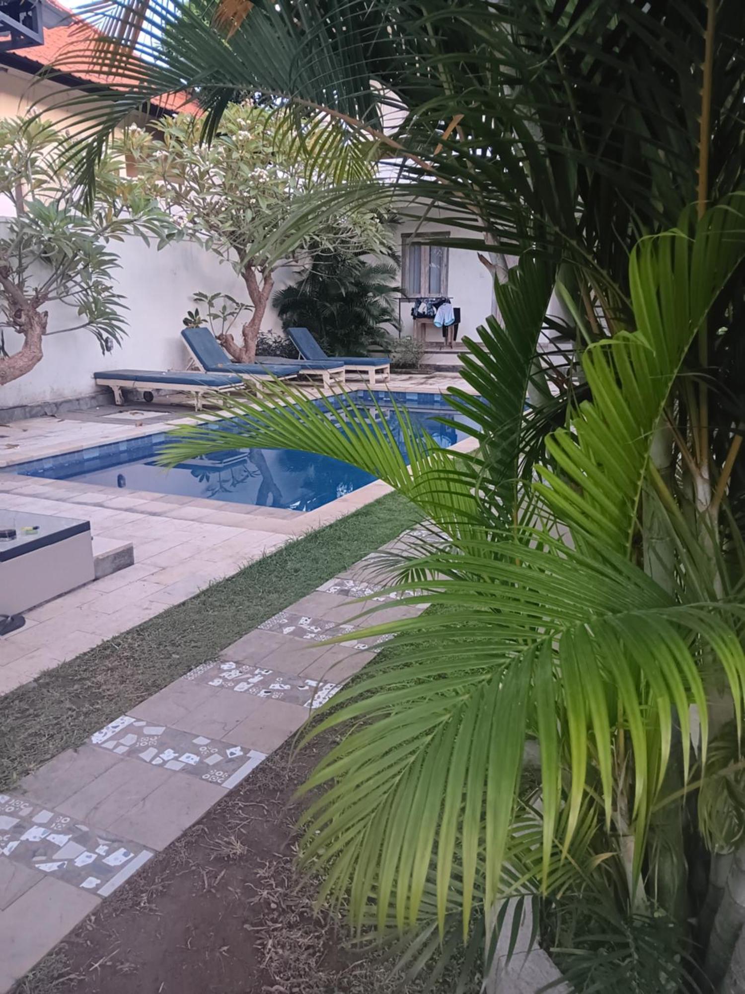 Adore Guesthouse Amed Zimmer foto