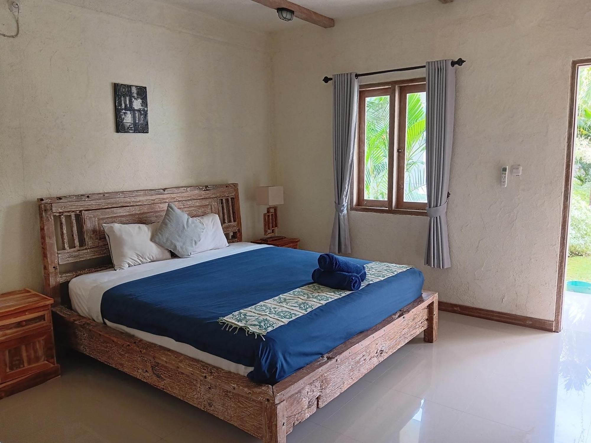 Adore Guesthouse Amed Zimmer foto