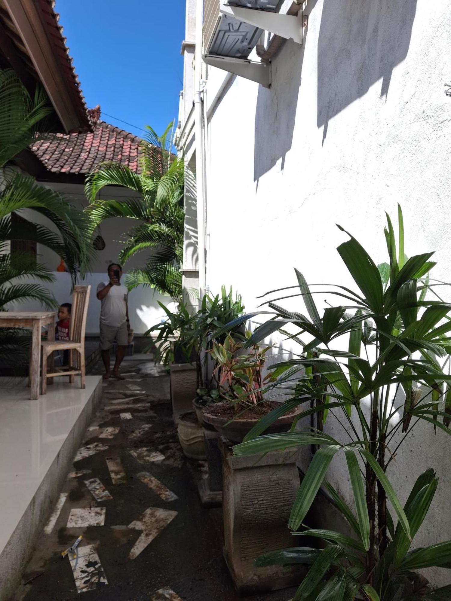 Adore Guesthouse Amed Zimmer foto
