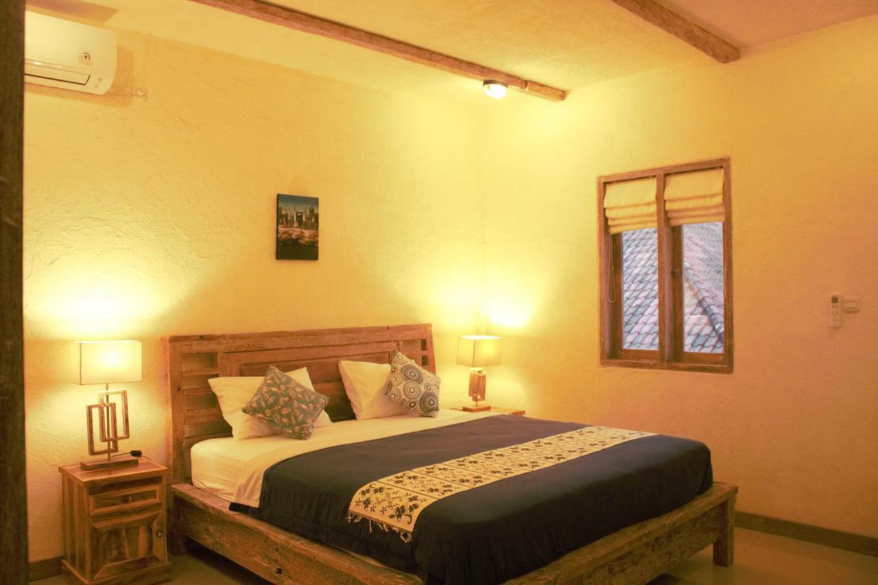 Adore Guesthouse Amed Exterior foto